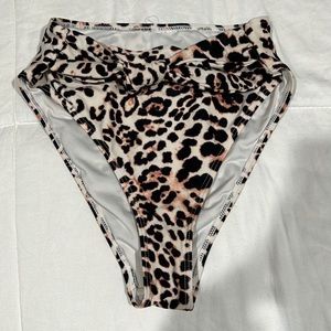 Cheetah print high-waisted bikini bottoms with front tie